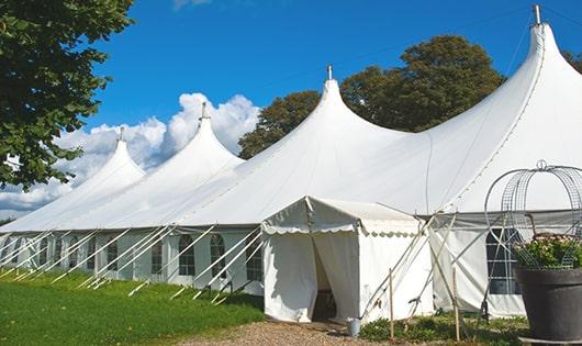 high-quality portable toilets stationed at a wedding, meeting the needs of guests throughout the outdoor reception in Chisholm